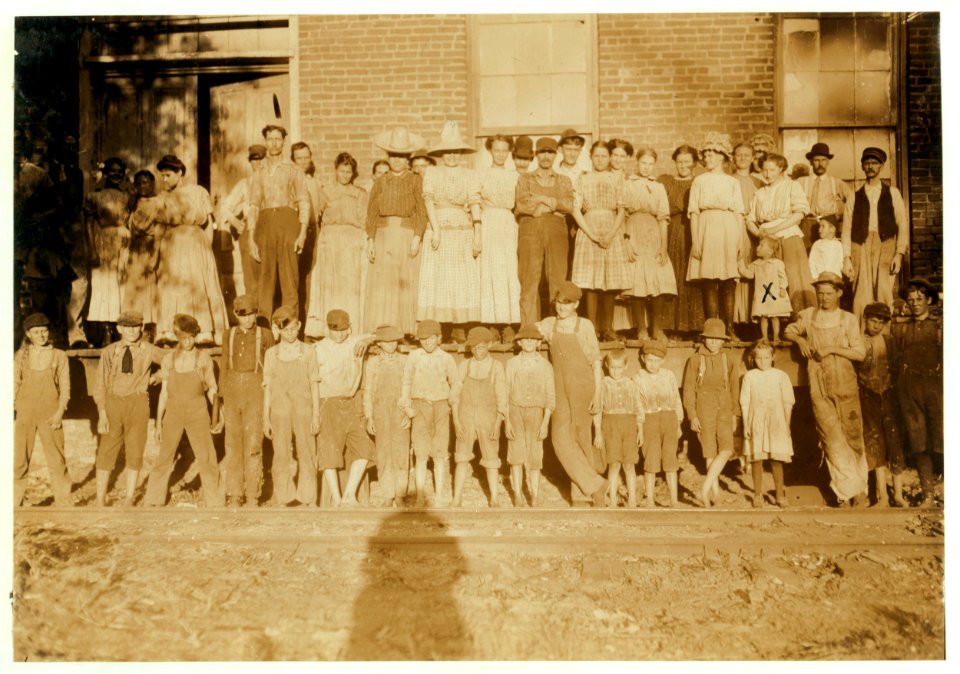 Nearly the entire force, Yooona (i.e., Yocona) Mills, Water Valley, Miss. Some of the smallest workers not in the photo. The three smallest ones in front row hang around and help some. Baby LOC nclc.02107