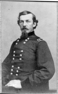 Nelson Appleton Miles, 1839-1925, half length, seated, facing front, wearing brevet Maj. Gen. uniform LCCN2006686850