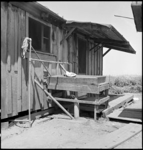 Near San Lorenzo, California. Close-up of one of the dwellings previously occupied by the five farm . . . - NARA - 537539 photo