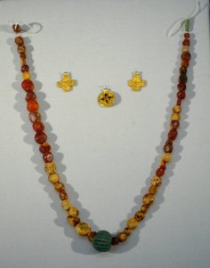 Necklace of amber, glass, and ceramic, with necklace pendants of gold and garnet, Tomb 146, 475-550 AD - Cinquantenaire Museum - Brussels, Belgium - DSC08759 photo