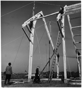 Netherlands. (Workmen working on the framing of a building.) - NARA - 541708