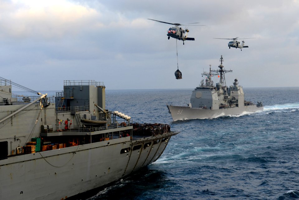 MH-60S helicopters transport cargo at sea. (8497236285)