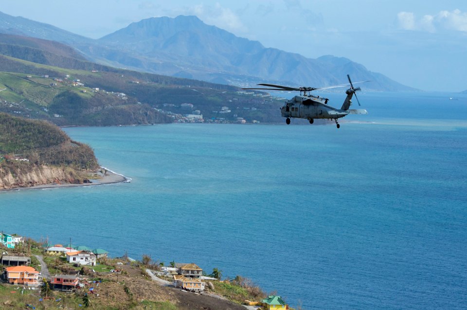 MH-60S helicopters survey damage over the island of Dominica. (37285051252)