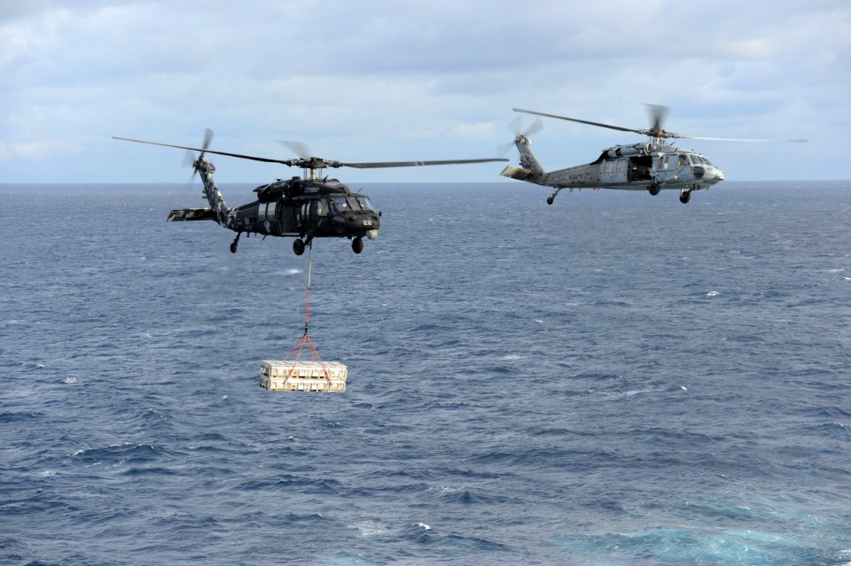 MH-60S Sea Hawks conduct an ammo onload. (8390303606)