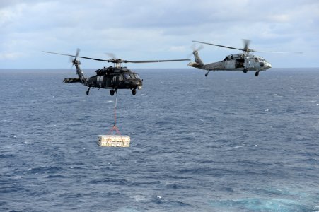 MH-60S Sea Hawks conduct an ammo onload. (8390303606)