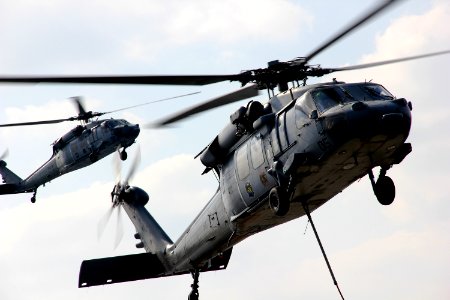 MH-60S helicopters transfer ammuntion. (8202185229)