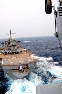 MH-60S Seahawk approaches USS Blue Ridge 140311-N-GR655-324