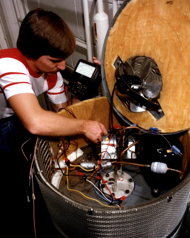 New heat pump water heater that works much like a window air conditioner