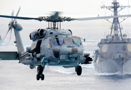 MH-60R Sea Hawk helicopter prepares to land aboard the aircraft carrier USS John C. Stennis (cropped)