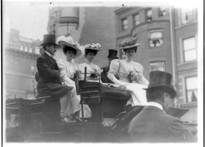 New York (City). Coaching club group on top of coach- Mr. & Mrs. Robert Brewster, Mrs. O. Gould Jennings and Rosamond Street LCCN2007680829