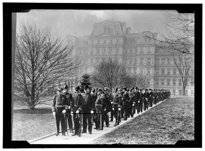 NEW YEAR'S RECEPTION AT WHITE HOUSE. ADMIRAL DEWEY, LEFT FRONT, AND OFFICERS STARTING FOR WHITE HOUSE. ADMIRAL BOB EVANS IS 3RD FROM FRONT, RIGHT LCCN2016867436
