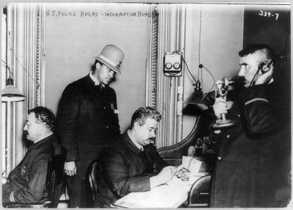 New York City Police Dept. activities- Information Bureau at HQ-4 men at work LCCN2006677372