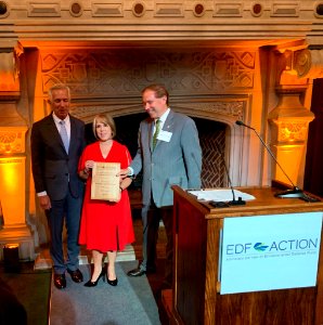 Michelle Lujan Grisham receives EDF award from Tom Udall in 2019