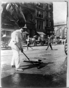 New York City sanitation dept. employee sweeping street, ca. 1910 LCCN2007682984