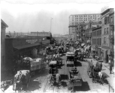 New York City. View along waterfront on West Street; many freight wagons; street car LCCN2007683148
