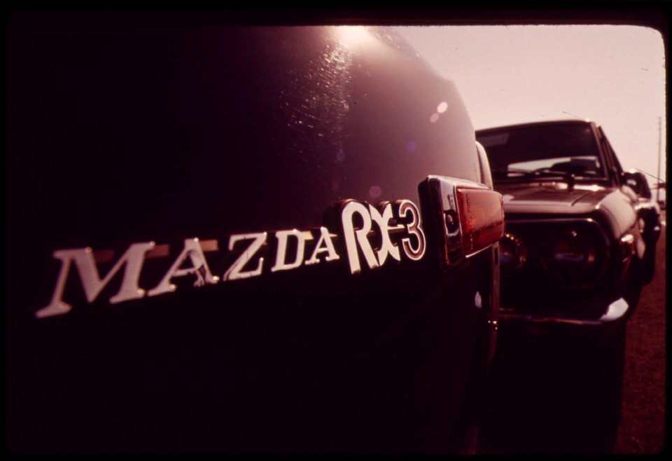New-cars-awaiting-shipment-at-terminal-island-part-of-the-los-angeles-waterfront-june-1973 6990297044 o