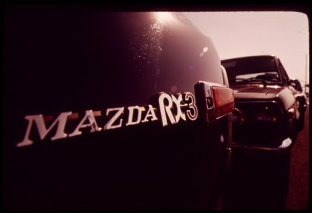New-cars-awaiting-shipment-at-terminal-island-part-of-the-los-angeles-waterfront-june-1973 6990297044 o