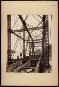 Newly installed span of Hawkesbury River Railway Bridge, New South Wales, Australia, with men posed on it, probably E.K. Morse and S.V. Ryland LCCN2016651647