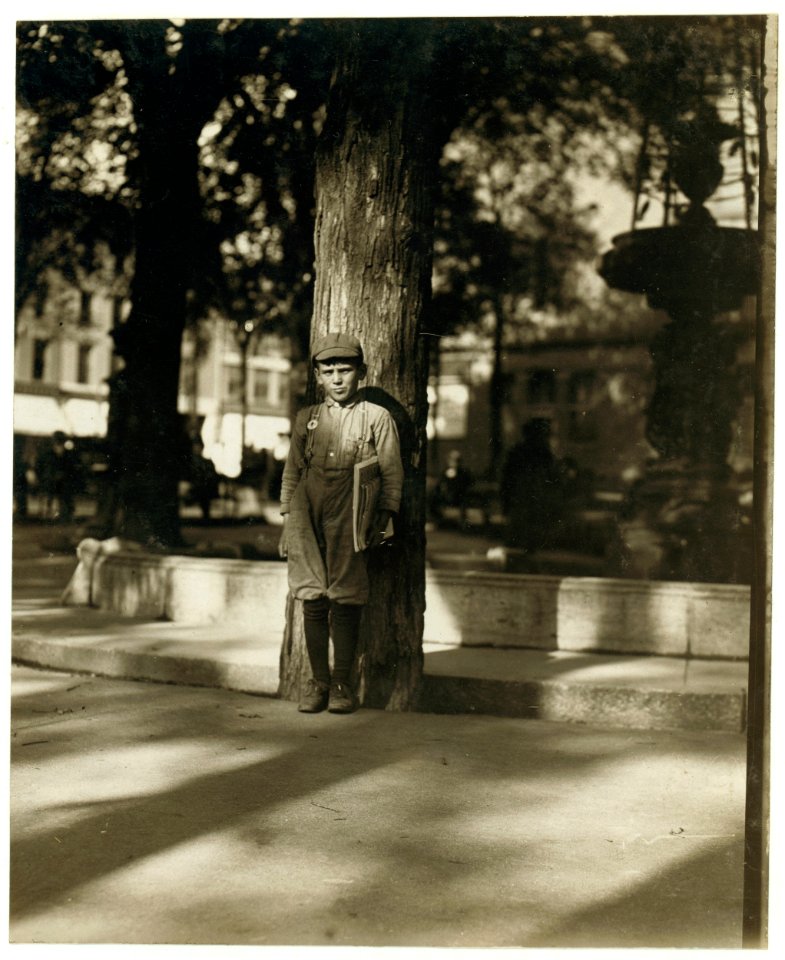 Newsboy in Park. Burlington, Vt. LOC nclc.03371
