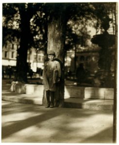 Newsboy in Park. Burlington, Vt. LOC nclc.03371