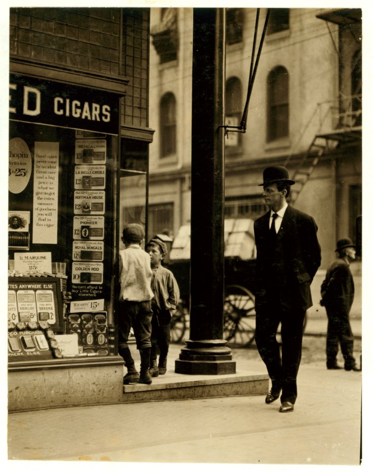 Newsboys, begging tobacco coupons. Edward F. Brown, Investigator. Lewis W. Hine. Photographer. LOC nclc.03631