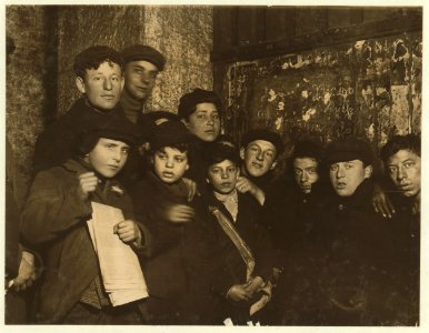 Newsie in cellar-room of a paper office in alley back of Main Street, waiting for evening papers, 4 P.M. Conditions here vile. LOC cph.3b42555