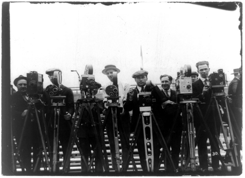 Newsreel cameramen with cameras at the Dempsey-Carpentier boxing match at Boyle's Thirty Acres, Jersey City, N.J. LCCN93515874