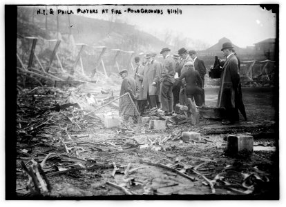 New York, NL & Philadelphia, NL players view fire damage, Polo Grounds LCCN2014689022