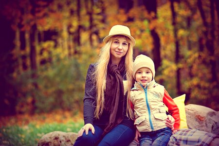 Mom son golden autumn