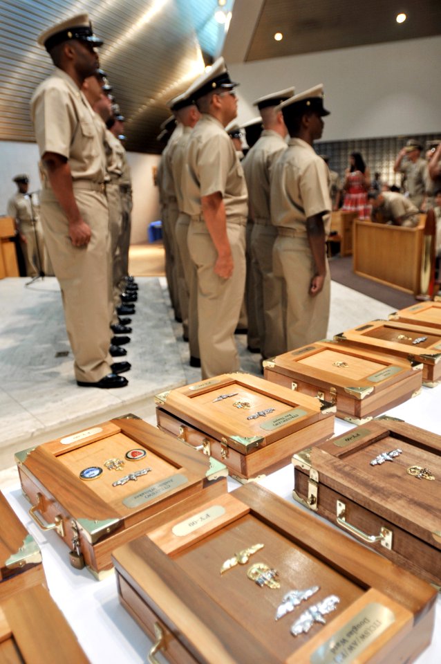Newly-minted chief petty officers are saluted by all fellow chief petty officers past and present - Corry Station