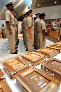 Newly-minted chief petty officers are saluted by all fellow chief petty officers past and present - Corry Station photo