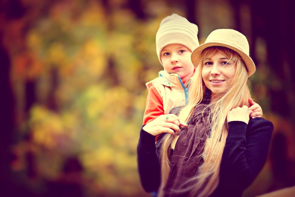 Mom son golden autumn