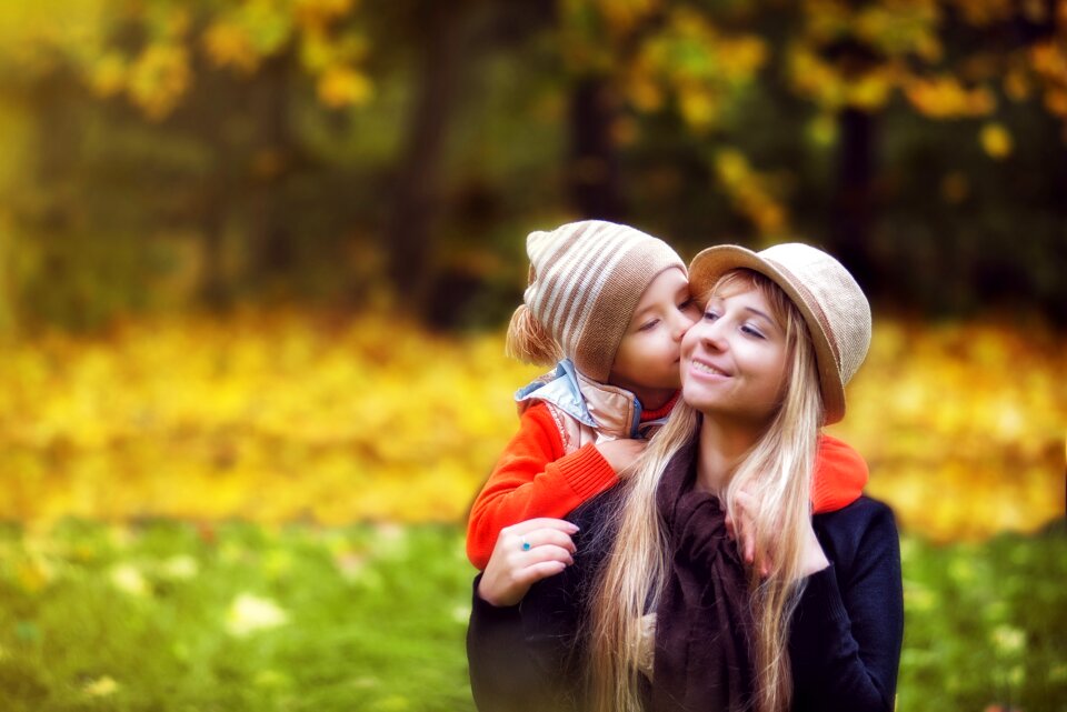 Mom son golden autumn