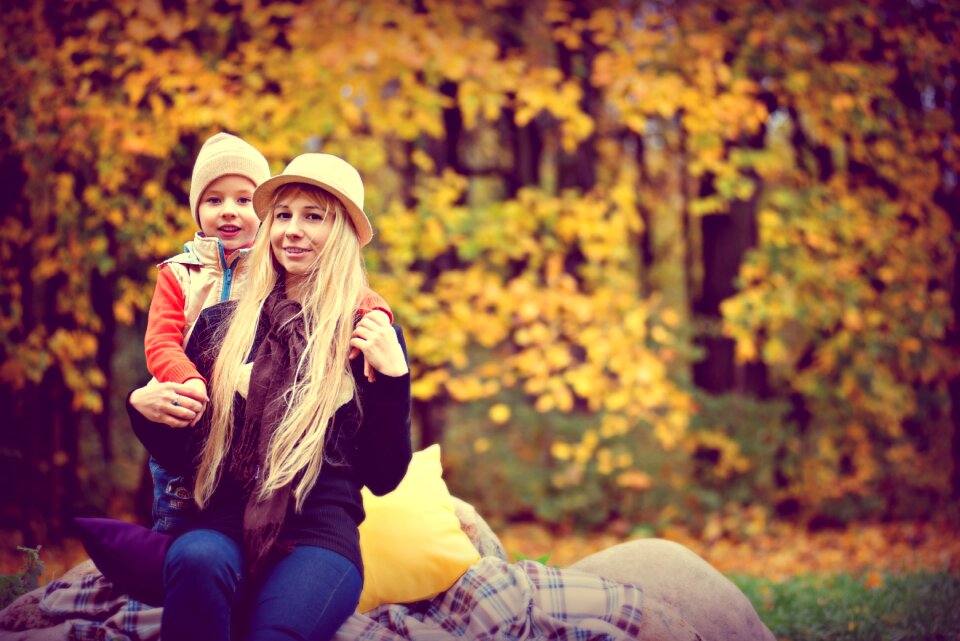 Mom son golden autumn