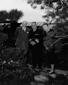 NH 62051 Fleet Admiral and Mrs. C.W. Nimitz in Garden photo