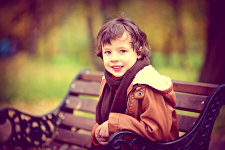 Child lavacore the boy on the bench nature photo