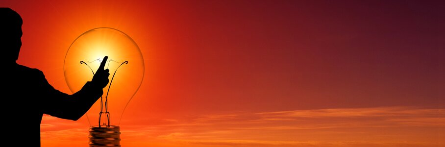 Energy revolution light bulb sun
