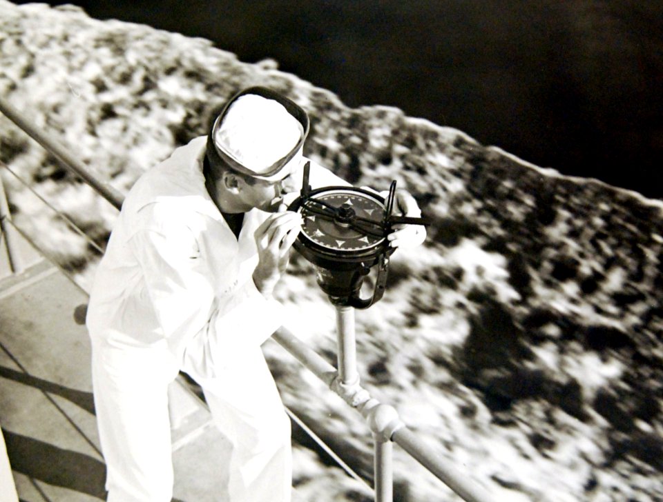 Midshipman takes a bearing from a compass, U.S. Navy, 1942 (38493562520)