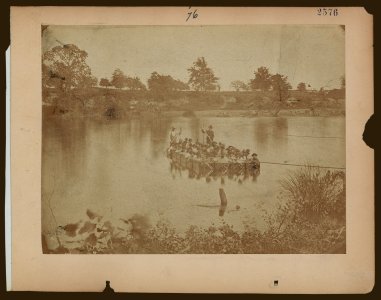 Military construction in northern Virginia- raft of blanket boats ferrying men across the Potomac River LCCN2006676192