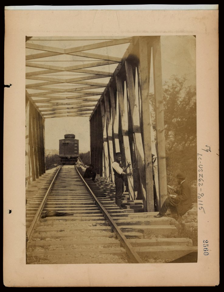 Military railroad operations in northern Virginia- men working on bridge LCCN97502062