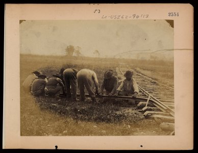 Military railroad operations in northern Virginia- African American laborers twisting rail LCCN97502056