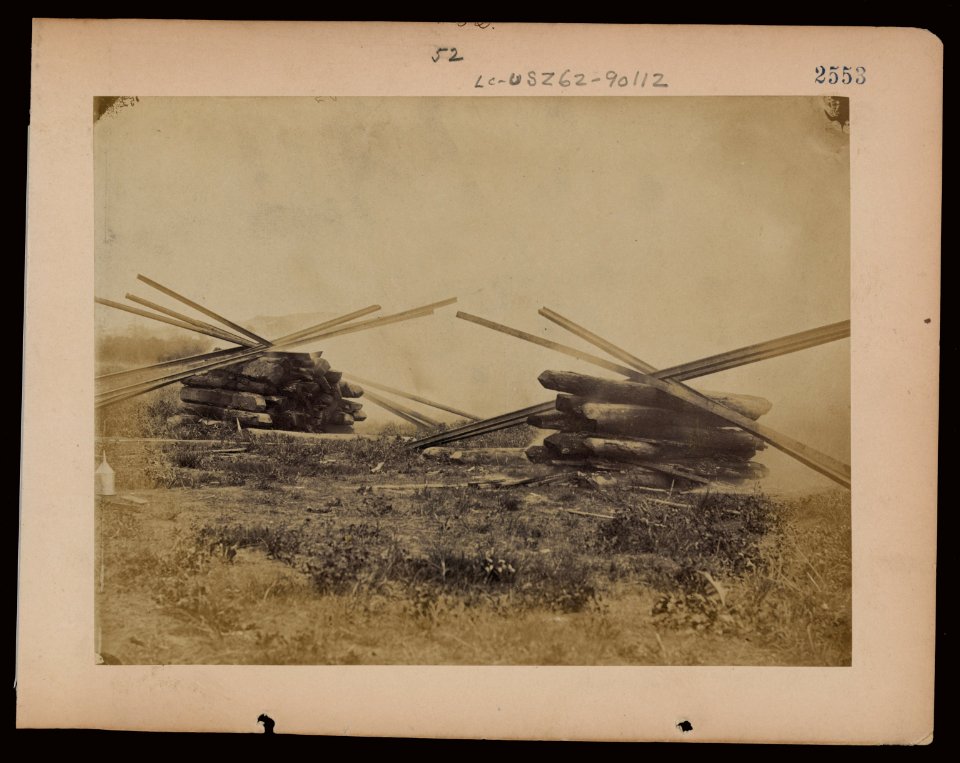 Military railroad operations in northern Virginia- two piles of rails and wooden ties LCCN97502052