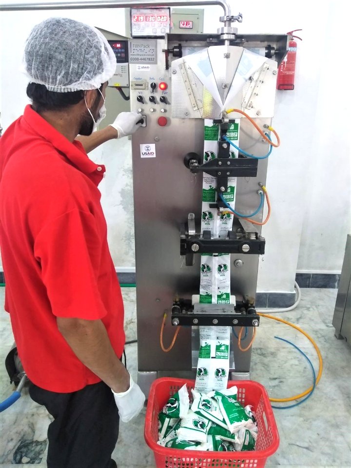 Milk bag packaging machine