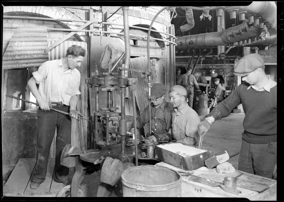 Millville, New Jersey - Glass bottles. Pressing and shaping in T. C. Wheaton Co - NARA - 518641