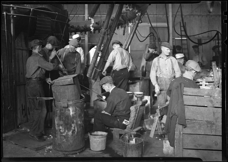 Millville, New Jersey - Glass bottles. T.C. Wheaton Co. Men working in shop. - NARA - 518643