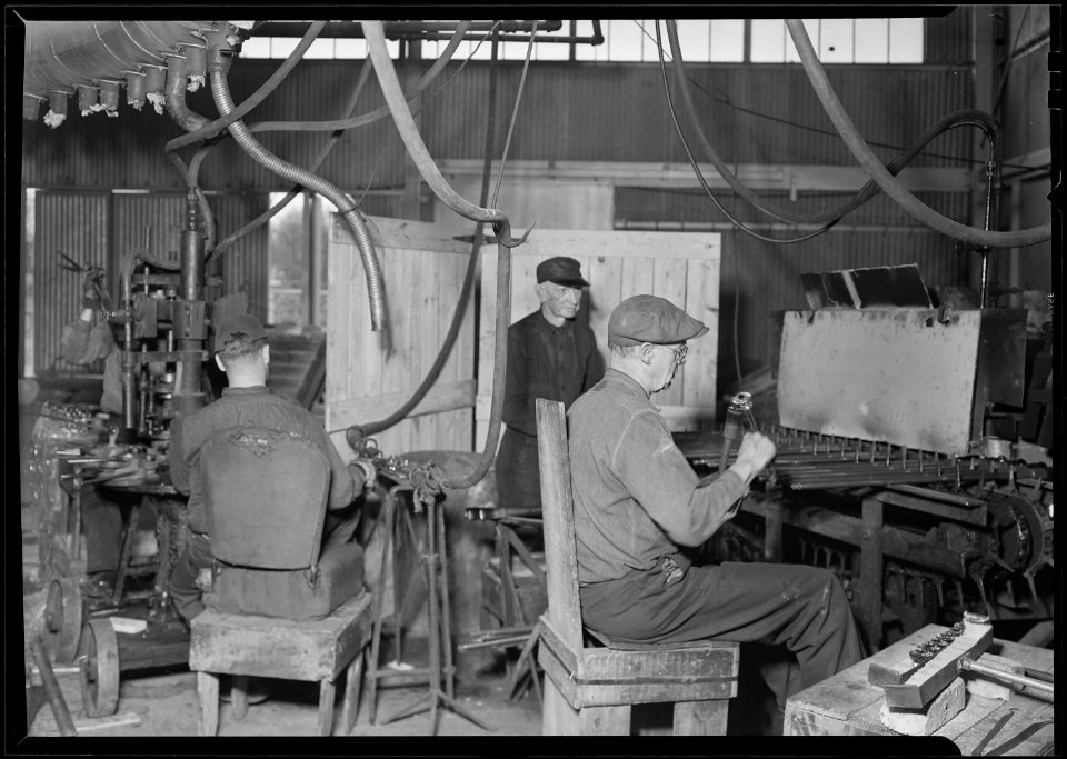 Millville, New Jersey - Glass bottles. T.C. Wheaton Co. The second shop of the shot in 411, finishing door knobs. The... - NARA - 518646