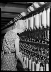 Millville, New Jersey - Textiles. Millville Manufacturing Co. (Lady twisting thread.) - NARA - 518681