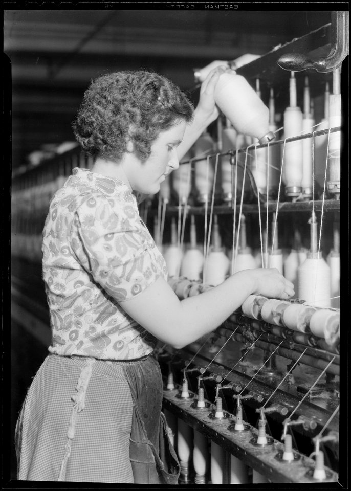 Millville, New Jersey - Textiles. Millville Manufacturing Co. (Woman pulling up bobbin.) - NARA - 518678