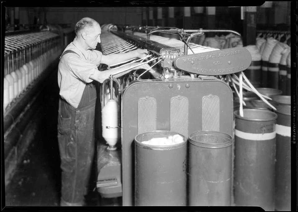 Millville, New Jersey - Textiles. Millville Manufacturing Co. (Man connecting threads.) - NARA - 518679