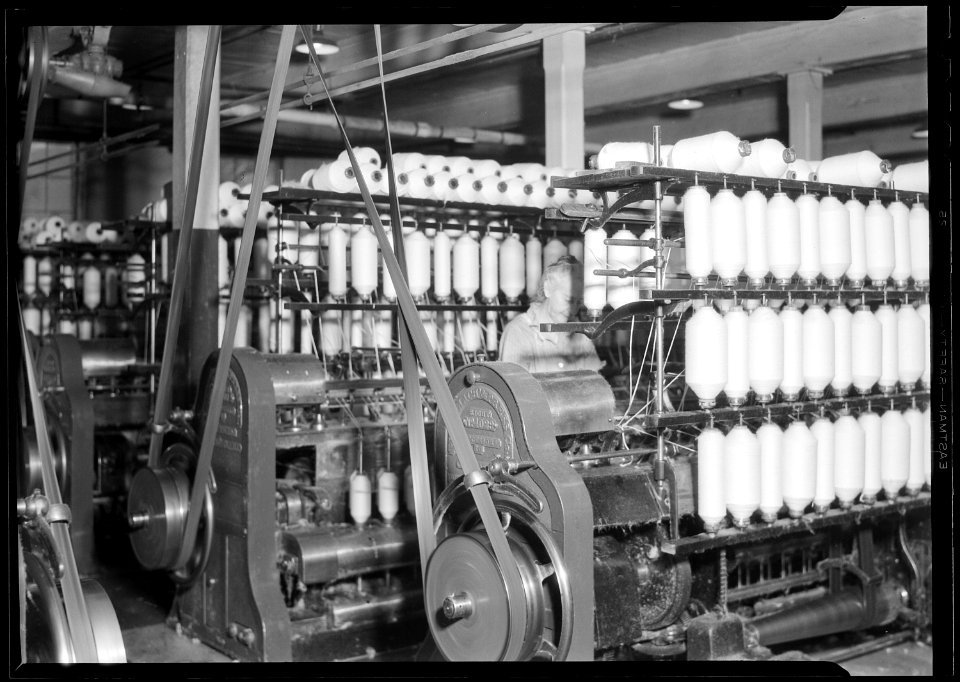 Millville, New Jersey - Textiles. Millville Manufacturing Co. (Man in between machines.) - NARA - 518684